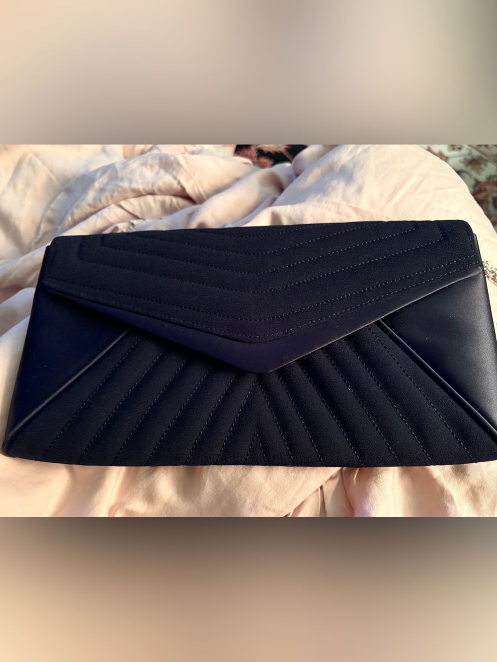 Sondra Robert’s navy blue silk quilted clutch evening bag